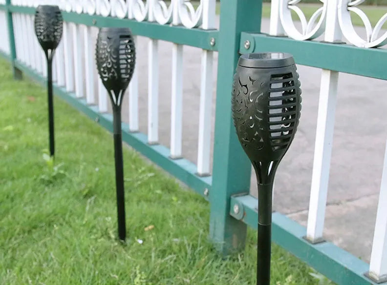 12vnt. LED saulės sodo šviestuvai, deglų imitacija, įsmeigiami 51 cm