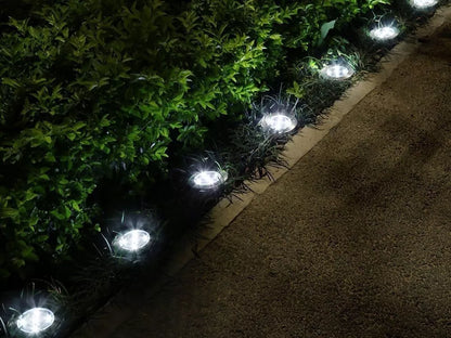 12 vnt. LED saulės energija varomi sodo šviestuvai, įsmeigiami į žemę, disko formos, galingi, 8 LED