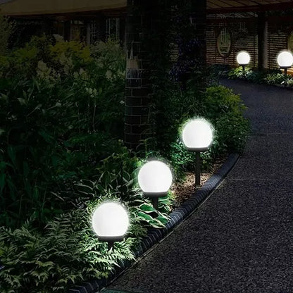 Ogródkowa lampa solarna LED w kształcie kuli, słupek do wbicia, 20 cm, czujnik zmierzchu, mocna