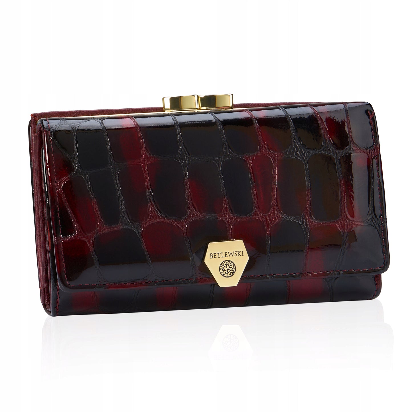 Stilinga lakuota odinė moteriška piniginė su monetų užsegimu Betlewski