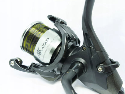 OKUMA AK 6000 ritė su valu + atsarginis būgnelis su laisva eiga PROMO