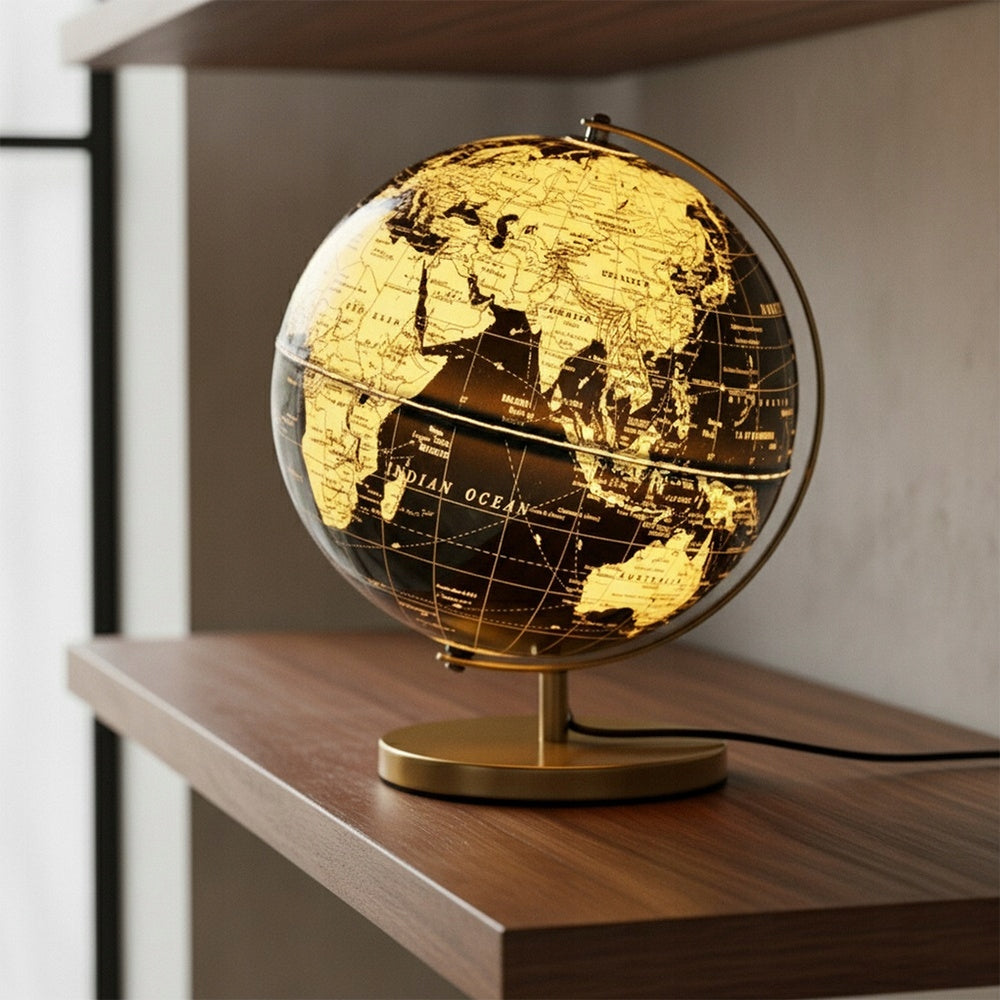 Lempa GLOBUS juoda ir auksinė, šviečianti, apšviesta stalinė lempa ant stalo