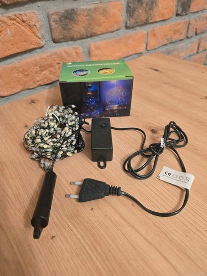 Kalėdinės eglutės lemputės "Angelų plaukai", 200 LED, 2m, baltos šaltos, laidelių užuolaida