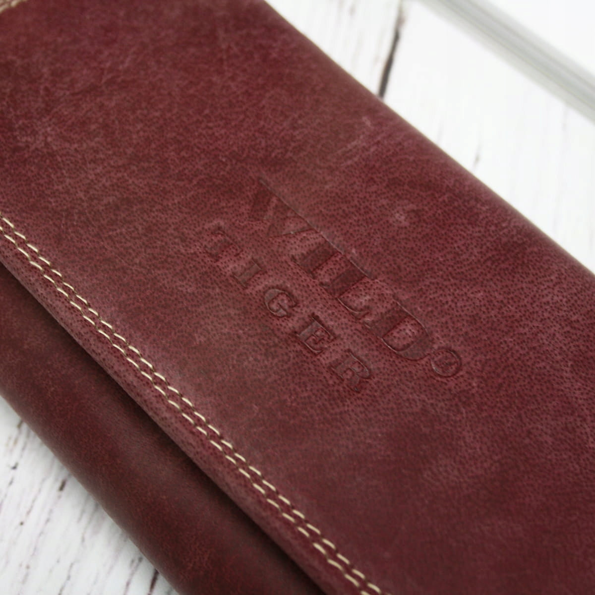 Moteriška piniginė nubuko oda Wild Tiger - tamsiai raudona