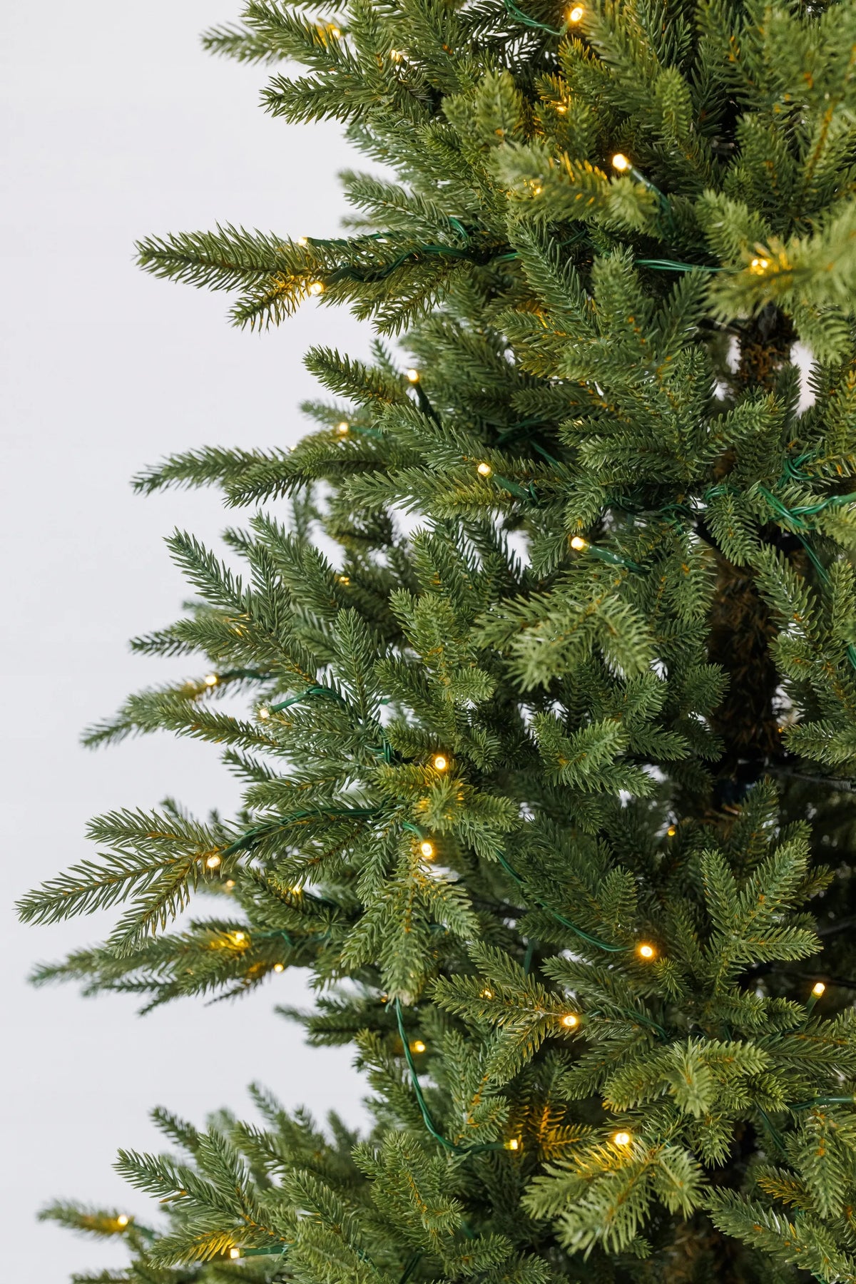 Dirbtinė eglutė Arkties eglė žalia PE+PVC 1,95 m + LED girlianda