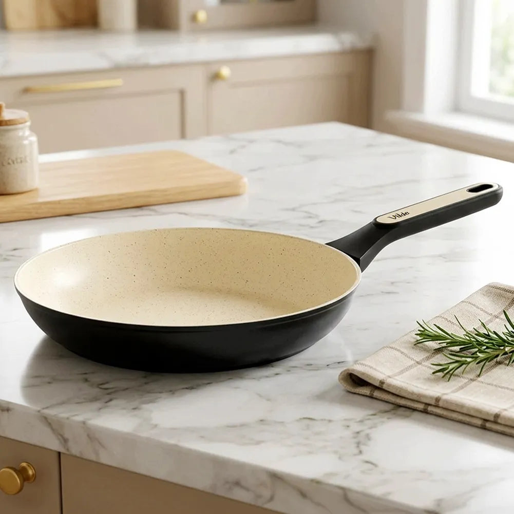 Granitinė keptuvė kepimui ir troškinimui Vilde Creamtica, skirta dujinėms ir indukcinėms viryklėms, 28 cm
