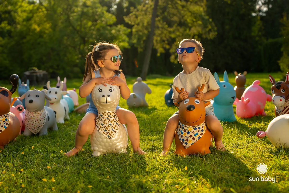 Guminis šokliukas vaikams su pompa „Sun Baby“, rožinė karvutė, nuo 12 mėn.