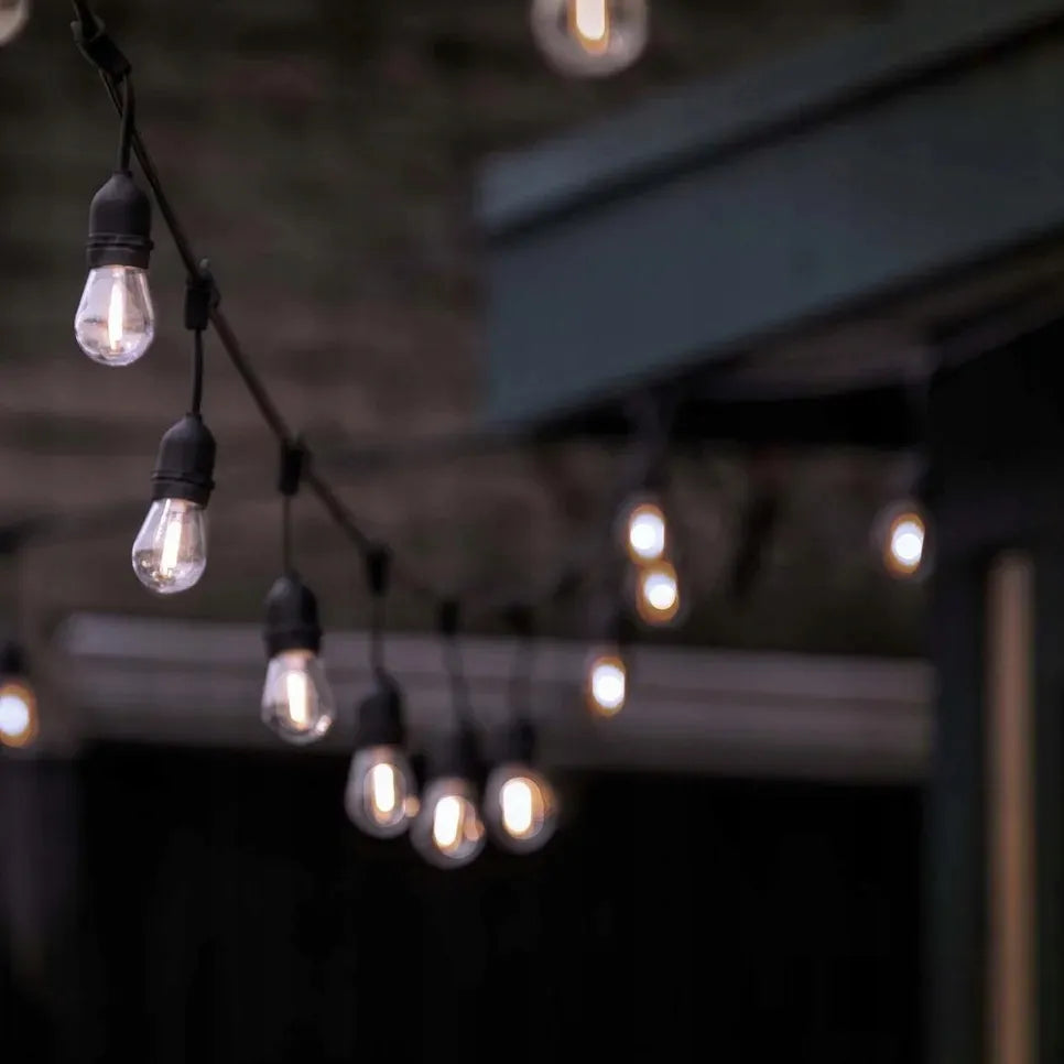 LED-ONE sodo girlianda 20m 230V + 20x LED E27 šiltai baltos lemputės