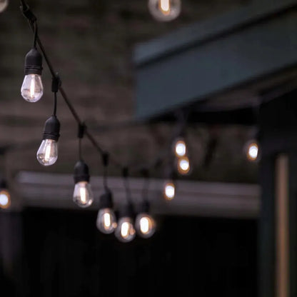 LED-ONE sodo girlianda 20m 230V + 20x LED E27 šiltai baltos lemputės