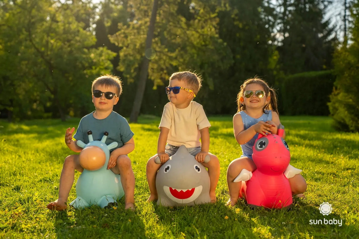 „Sun Baby“ mėlynas guminis žirafos formos šokliukas vaikams su pompa, nuo 12 mėn.