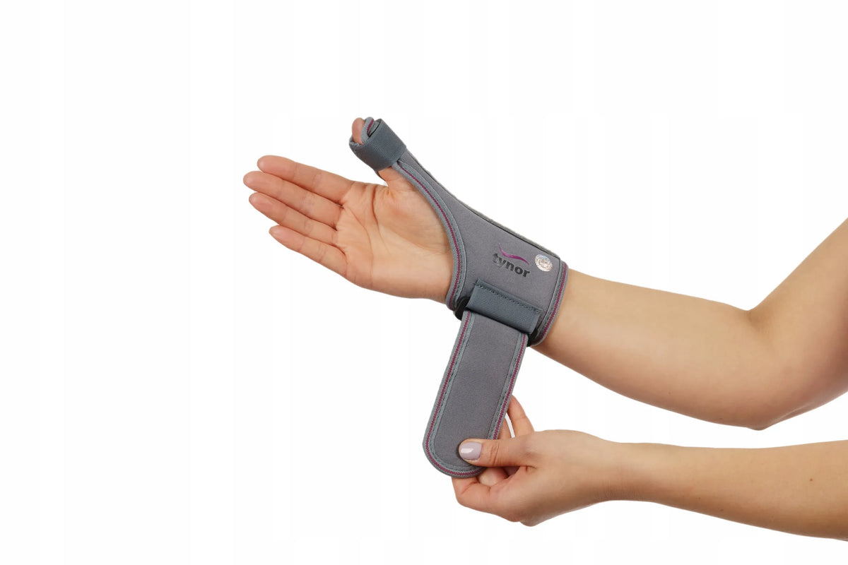 Tynor F-06 nykščio įtvaras su metaliniu sutvirtinimu, universalus, riešui ir plaštakai