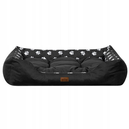 Vandeniui atspari šunų guolis-sofa Doggy Puffy, dydis XL (92x73 cm), juodas su pėdutėmis
